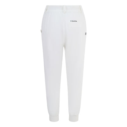 Women's cuffed golf trousers in white with belt loops, pockets and four-way stretch fabric