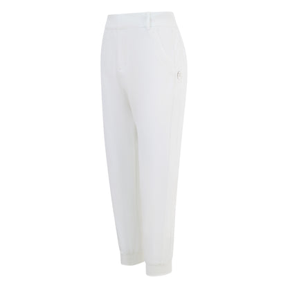 Women's cuffed golf trousers in white with belt loops, pockets and four-way stretch fabric