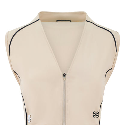 Women’s sleeveless golf dress in sand with half-zip front, stretch frabic and pockets